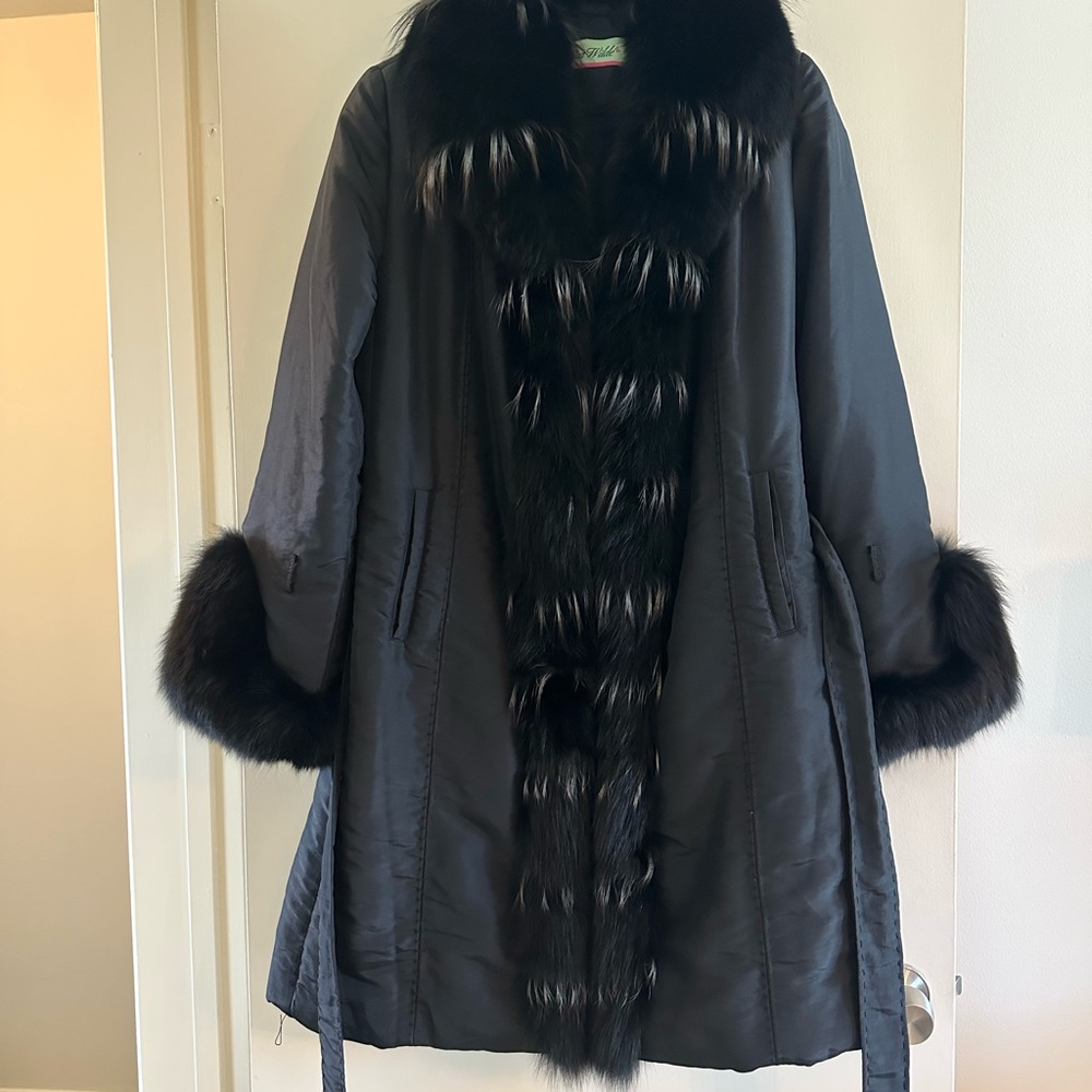 Coat with fur trimmings